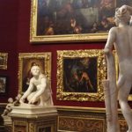statues and paintings inside uffizi gallery